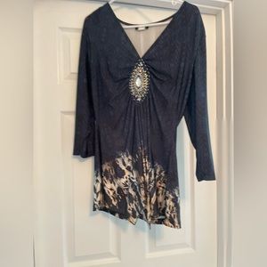 Worn one time. Super silky material and very flattering